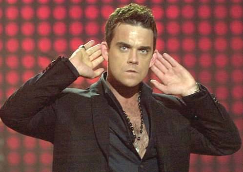 Robbie Williams: Seksi më mban në formë